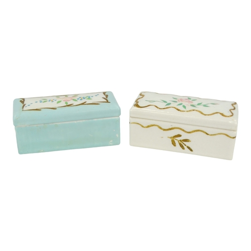 48 - A late 19th century Limoges stamp box - duck egg blue and decorated with flowers, 9cm wide, together... 