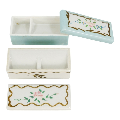 48 - A late 19th century Limoges stamp box - duck egg blue and decorated with flowers, 9cm wide, together... 