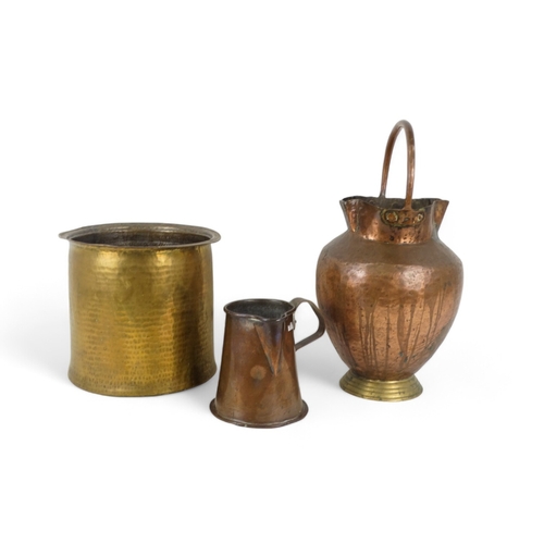 50A - A 19th century copper jug - with straight tapering sides,  16cm high, together with a brass jardinie... 