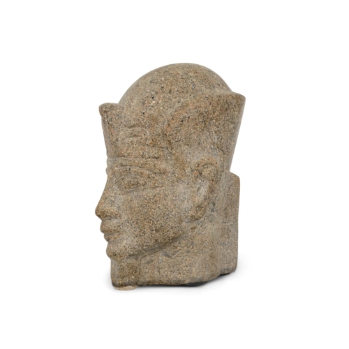 60 - A reconstituted stone figure of an Egyptian god - 23cm high.