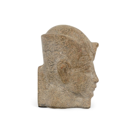 60 - A reconstituted stone figure of an Egyptian god - 23cm high.