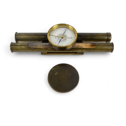 63 - A 19th century surveyor's level - incorporating a compass, sighting tube and bubble level, 23cm long... 