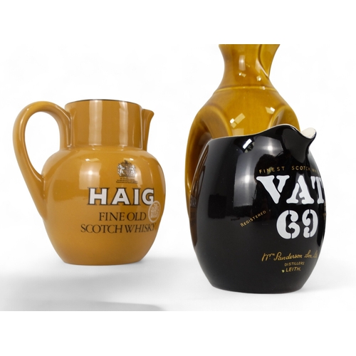 74 - A Carlton Ware Haig whisky water jug - the company branding on a khaki ground, 16cm high, together w... 