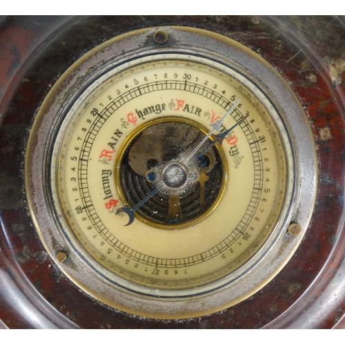 91A - An early 20th century turned serpentine table compass - 10cm diam, together with an aneroid baromete... 