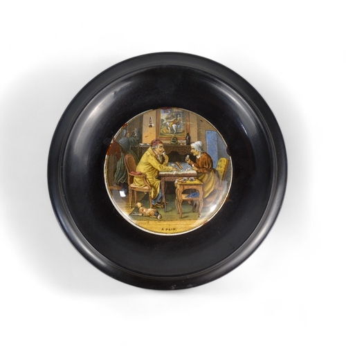 94A - Two Prattware pot lids in wooden frames - 'Uncle Toby' and 'A Pair', each 19.5cm.