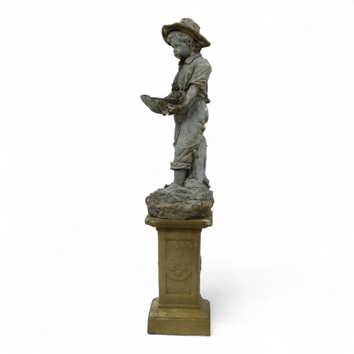 95 - A resin statue modelled as a boy holding a shell - on a reconstituted stone floral decorated plinth,... 