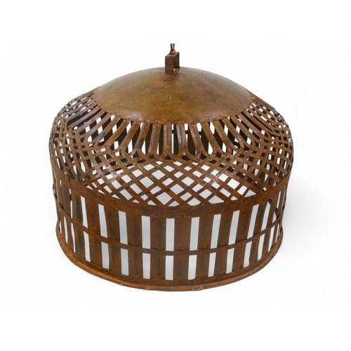 96 - A woven steel and riveted chicken coup - diameter 71cm.