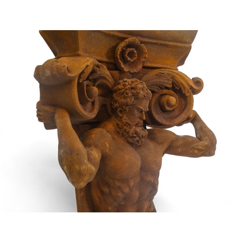 99 - A resin plaque modelled as Hercules - supporting a Corinthian column, height 55cm.