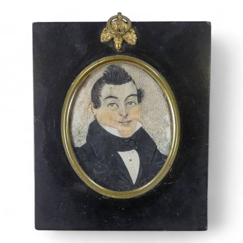 103 - An early 19th century portrait miniature - a gentleman in white shirt and black stock and coat, oval... 