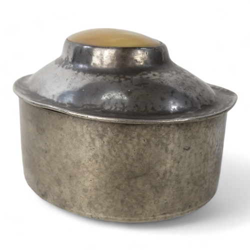 15 - A early 20th century pewter box by Liberty & Co - oval inset with mother-of-pearl, stamped to base.