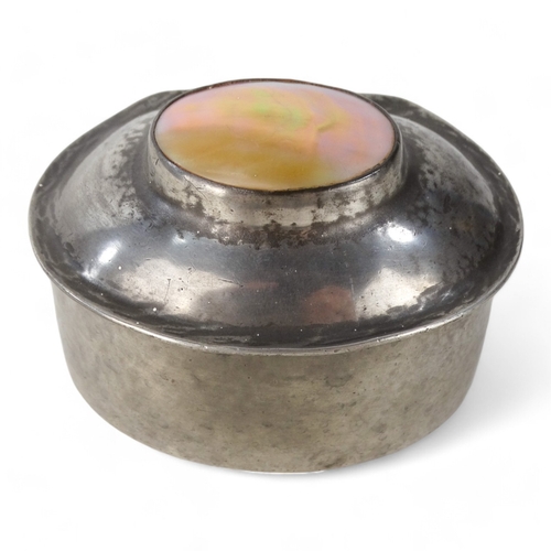 15 - A early 20th century pewter box by Liberty & Co - oval inset with mother-of-pearl, stamped to base.