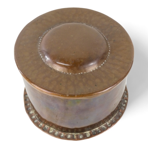 16 - A copper string box by John Pearson - circular with a riveted seam and domed cover, stamped to base,... 