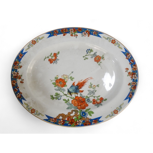 214 - An early 19th century Ironstone footed dish - decorated with birds and flowers, 29cm diameter, toget... 