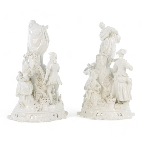 216 - A Meissen blanc de chine figure group - surmounted by a woman with guitar and figures below with flo... 