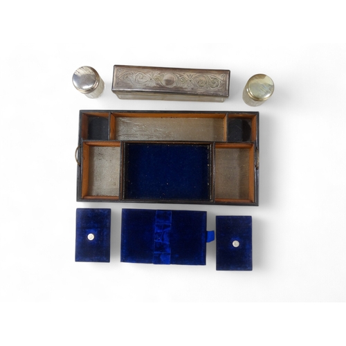 22 - A late Victorian walnut dressing case - the blue velvet fitted interior with glass and silverplated ... 