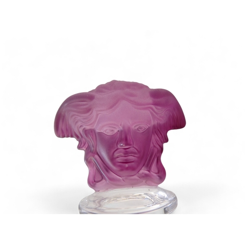 227 - Versace for Rosenthal crystal Medusa wine bottle stopper - of purple moulded glass, length 12cm, box... 