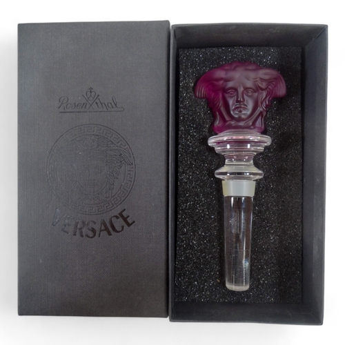 227 - Versace for Rosenthal crystal Medusa wine bottle stopper - of purple moulded glass, length 12cm, box... 