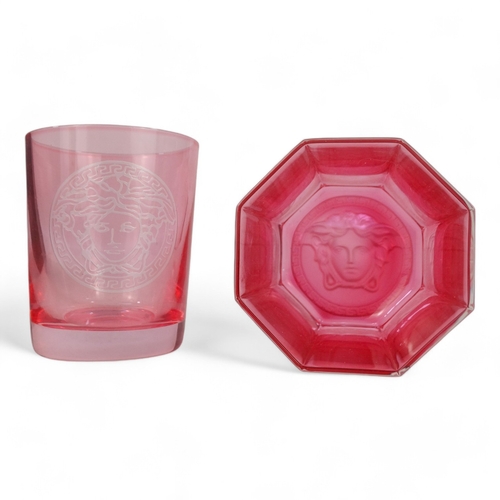 228 - Versace for Rosenthal whisky glass - of pink faceted form with impressed Medusa head to base, boxed ... 