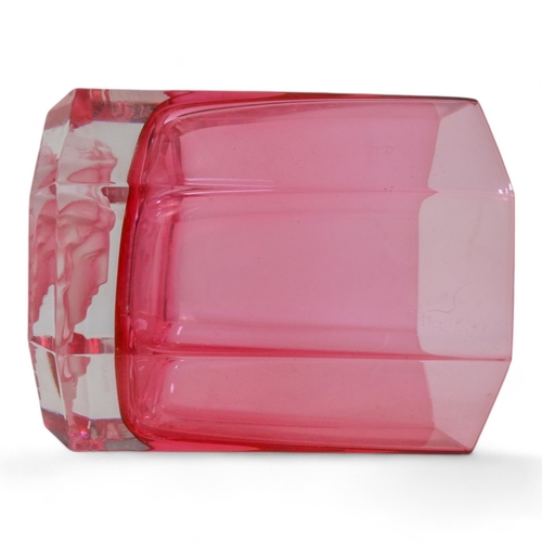 228 - Versace for Rosenthal whisky glass - of pink faceted form with impressed Medusa head to base, boxed ... 