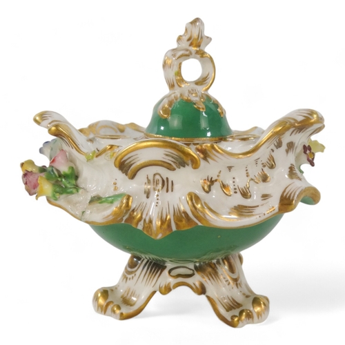 238 - A 19th century Coalport inkwell - encrusted with flowers and gilt foliage, on an apple green ground,... 