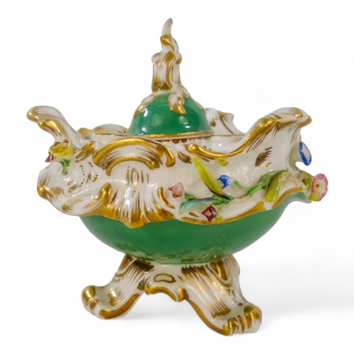 238 - A 19th century Coalport inkwell - encrusted with flowers and gilt foliage, on an apple green ground,... 