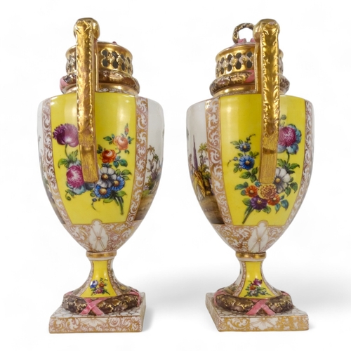 239 - A pair of Dresden vases - with reticulated covers and twin handles, painted with figures in a landsc... 