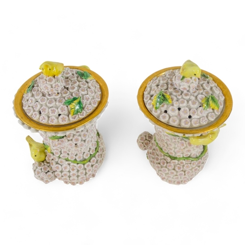 240 - A pair of Meissen style flower encrusted vases - of baluster form with yellow birds, 18cm high. (2)