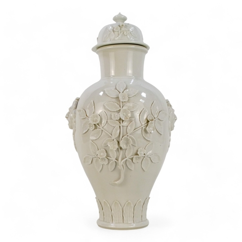 254 - A Meissen style Blanc de chine vase and cover - of baluster form cast with flowers and head of Medus... 