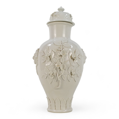 254 - A Meissen style Blanc de chine vase and cover - of baluster form cast with flowers and head of Medus... 