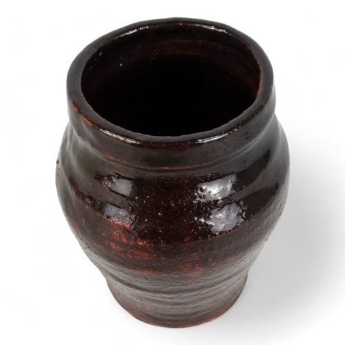 268 - A St Ives Pottery tenmoko glazed pot - of squat baluster form.