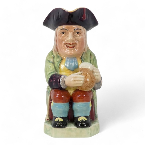 276 - A 20th century Toby jug - marked Toby Philpot to base, 21cm high, together with a Lingard teapot mod... 