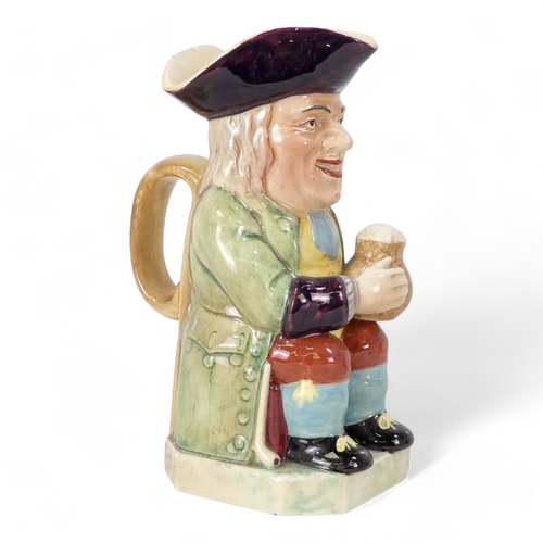 276 - A 20th century Toby jug - marked Toby Philpot to base, 21cm high, together with a Lingard teapot mod... 