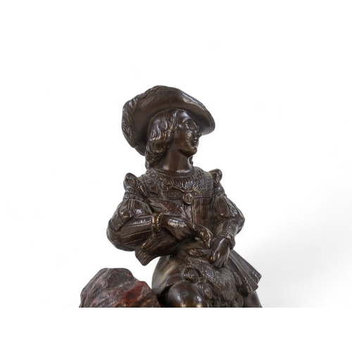 49 - A bronze modelled as a Dutch falconer - kneeling on a pile of rocks and mounted on a marble base, he... 