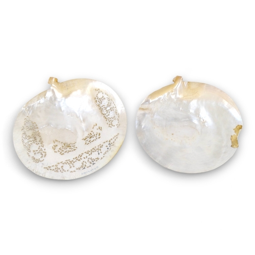 53 - Two Jerusalem carved mother of pearl religious shell tokens - pierced and decorated with Christian i... 