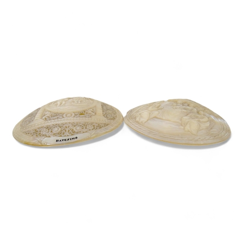 53 - Two Jerusalem carved mother of pearl religious shell tokens - pierced and decorated with Christian i... 