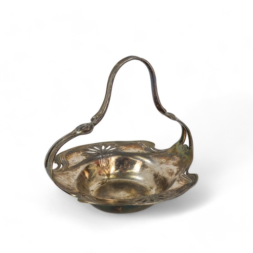 61 - An Alfenide metal basket in the Art Nouveau style - pierced with foliage with a shaped hoop handle, ... 