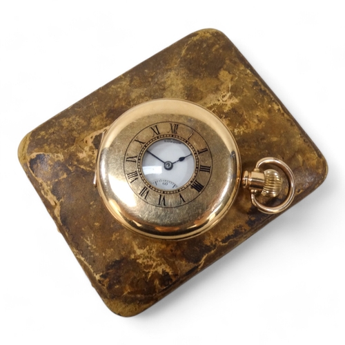 702 - A gold plated half hunter pocket watch by James Walker Ltd., - the white enamel dial set out with Ro... 