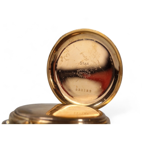 702 - A gold plated half hunter pocket watch by James Walker Ltd., - the white enamel dial set out with Ro... 