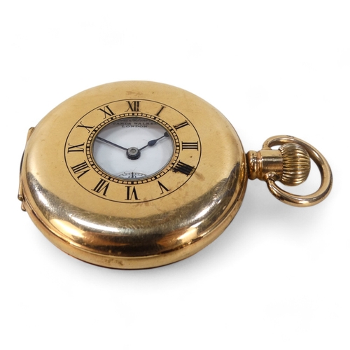 702 - A gold plated half hunter pocket watch by James Walker Ltd., - the white enamel dial set out with Ro... 