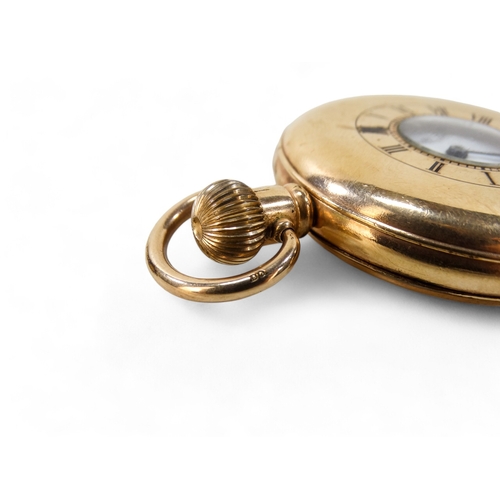 702 - A gold plated half hunter pocket watch by James Walker Ltd., - the white enamel dial set out with Ro... 