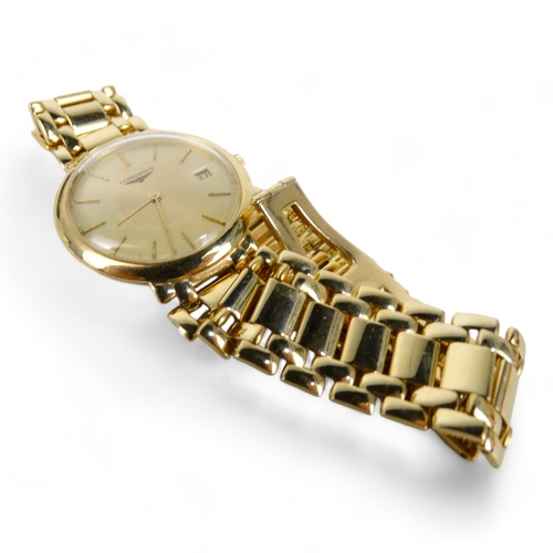 711 - A yellow metal gentleman' Longines wristwatch - probably 18ct gold, the gilt dial with baton markers... 