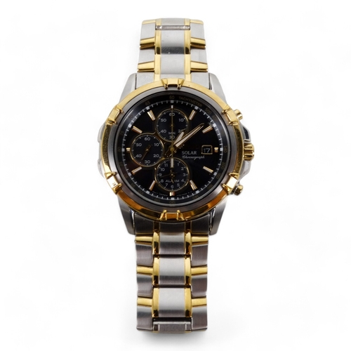 716 - A Seiko gentlemans chronograph wristwatch - steel case and strap, the black dial with baton numerals... 