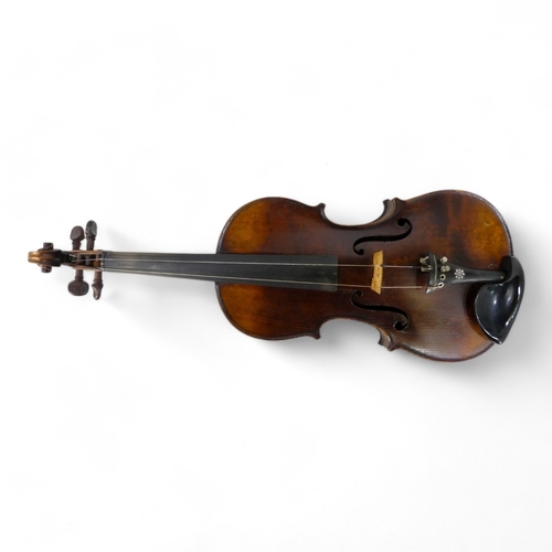 89 - A 19th century German violin - with a single piece back, 60cm, together with a hardcase and bow.