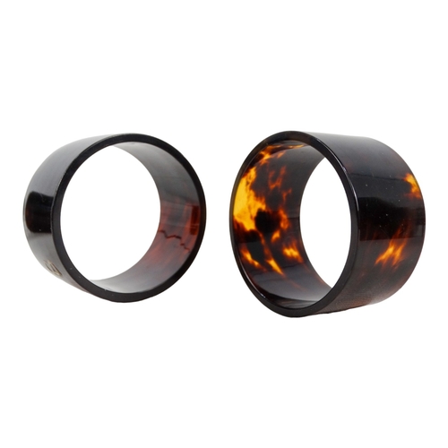 93 - Six plastic napkin rings - with tortoiseshell style decoration and applied with white metal numbers.