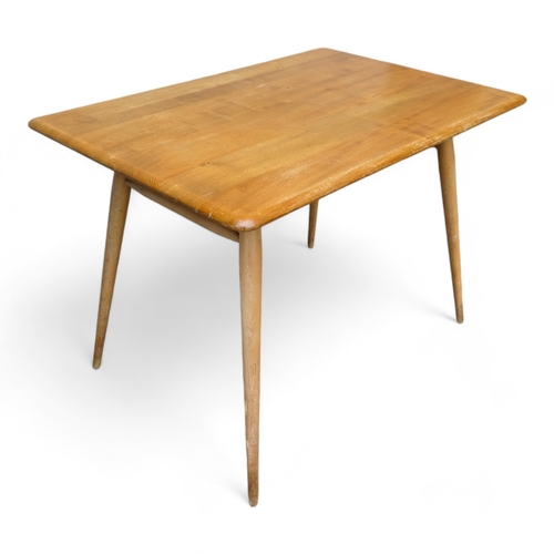 952 - An Ercol elm occasional table - the rectangular top on turned beech legs joined by a spindle underti... 