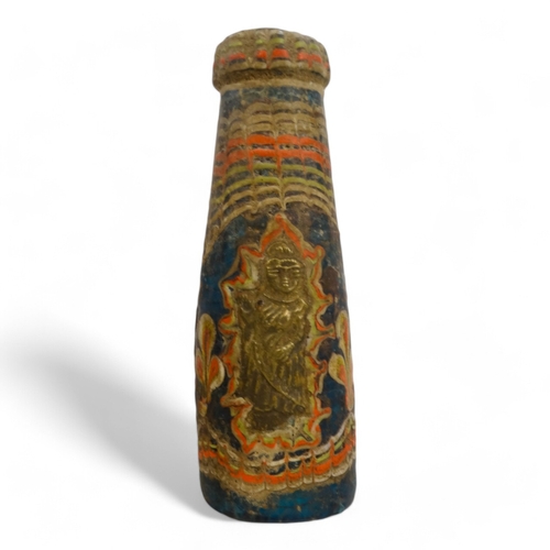 104 - A Persian glass bottle - of blue and red marbled design set three figures, 15cm high.