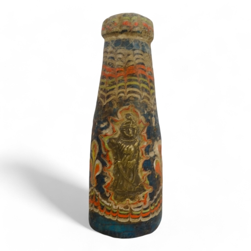 104 - A Persian glass bottle - of blue and red marbled design set three figures, 15cm high.