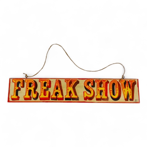 128 - A painted sign 'Freak Show' - 19.5 x 104cm.