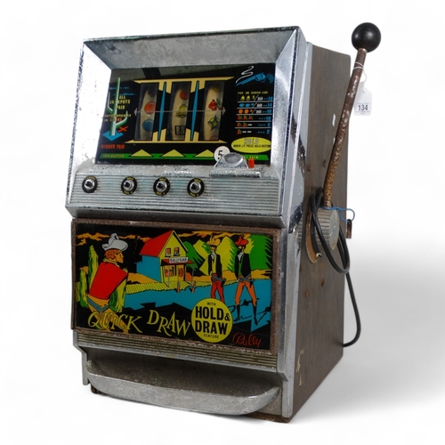 134 - A Modern Automatic company 'Quick Draw' fruit machine - chrome front with Cowboy imagery.