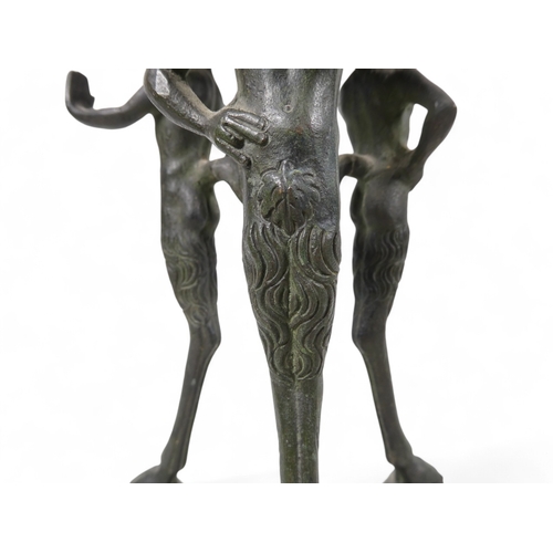 137 - A 19th century bronze torchiere - the cauldron on three faun supports, 26cm high.